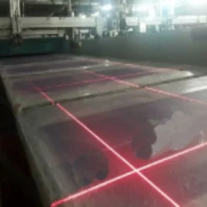 Red laser positioning module for fabric cutting machine alignment