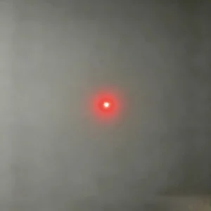 Red dot laser module projecting a point beam for positioning alignment